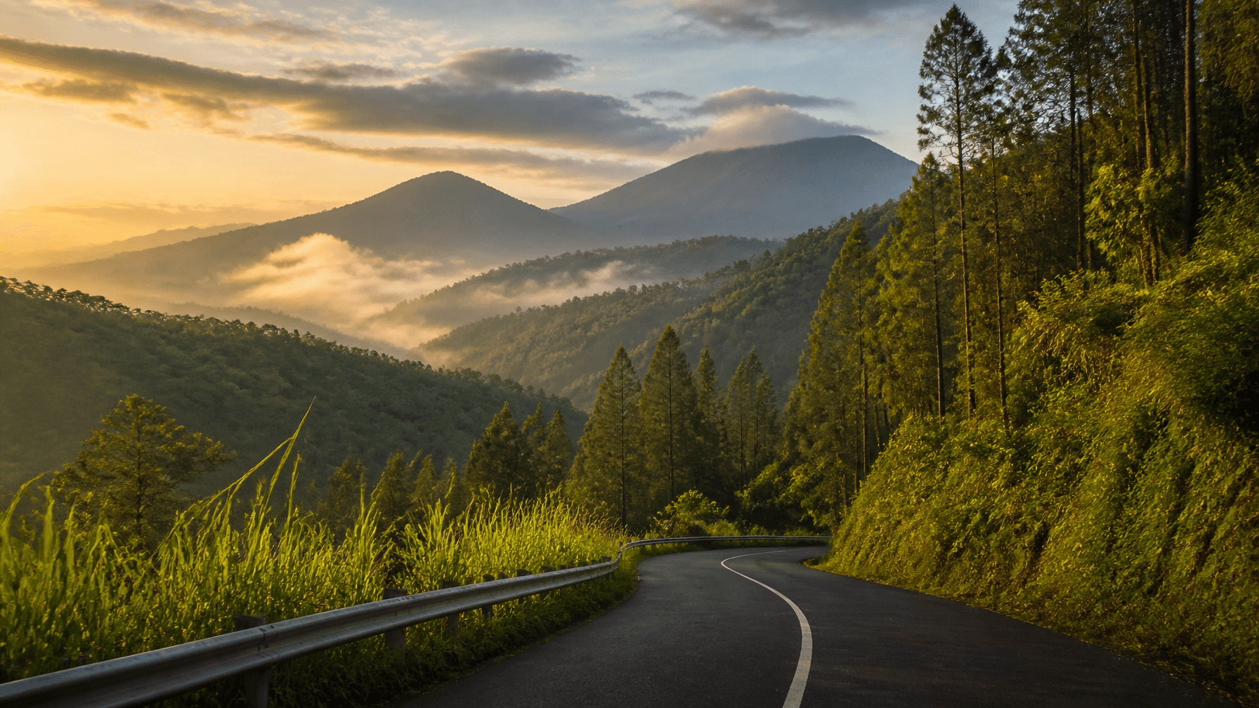 A breathtaking cinematic wide shot of a winding mountain road through lush green pine forests and mi